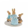 Mrs. Rabbit with a Christmas Pudding Figurine