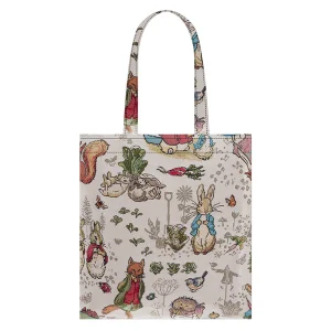 This Peter Rabbit Flat bag from Signare is an eco-friendly tote bag. Perfect for everyday use! Beatrix Potter’s “The Tale of Peter Rabbit” is one of her most famous and enduring works, but it’s not a Victorian creation; it was first published in 1902. The Victorian era officially ended with the death of Queen Victoria in 1901. Nevertheless, the influence of Victorian culture and sensibilities is apparent in Beatrix Potter’s works. Fantastic amount of storage for shopping, supermarket or grocery. Flat and easy to store (or to fold) in a handbag. Made from 100% recycled yarn and recyclable polyester. Product size (cm): Size 38 cm x 36 cm, Strap Length: 25 cm Made from eco dyed yarn, 100% recyclable polyester. Clean it with a damp cloth. Do not soak in water.